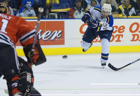 20 April 2002: Pavol Demitra #38 of the St. Louis Blues takes a shot on Jocelyn Thibault #41 of the Chicago Blackhawks during game two of the Western Conference Quarterfinal series between the Chicago Blackhawks and the St. Louis Blues at the Savvis Center in St. Louis, Missouri. The St. Louis Blues beat the Chicago Blackhawks 2-0. DIGITAL IMAGE. Mandatory Credit: Elsa/ Getty Images/NHLI