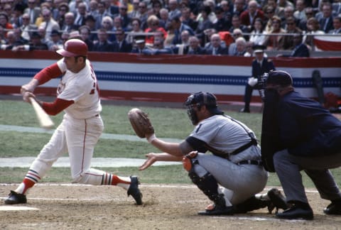 ST. LOUIS, MO – OCTOBER 1968: Tim McCarver #15 of the St. Louis Cardinals bats against the Detroit Tigers during the 1968 World Series in October 1968, at Busch Stadium in St. Louis, Missouri. The Tigers won the series 4 games to 3. (Photo by Focus on Sport/Getty Images)