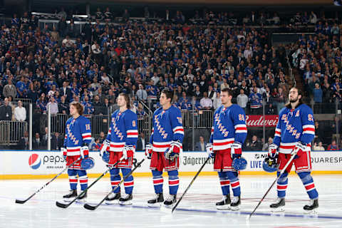 NEW YORK, NY – OCTOBER 03: (L-R) Artemi Panarin #10, Jacob Trouba #8, Brady Skjei #76, Pavel Buchnevich #89 and Mika Zibanejad #93 of the New York Rangers look on during the singing of the national anthems prior to the game against the Winnipeg Jets at Madison Square Garden on October 3, 2019 in New York City. (Photo by Jared Silber/NHLI via Getty Images)