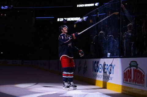 Oct 21, 2016; Columbus, OH, USA; Columbus Blue Jackets defenseman Zach Werenski (8) throws a stick into the stands after being named a star of the game after defeating the Chicago Blackhawks at Nationwide Arena. The Blue Jackets won 3-2. Mandatory Credit: Aaron Doster-USA TODAY Sports