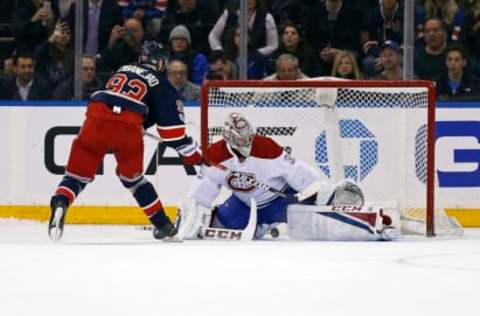 Feb 21, 2017; New York, NY, USA; Montreal Canadiens goalie Carey Price (31) stops a shot by New York Rangers center Mika Zibanejad (93) during a shoot-out at Madison Square Garden. Mandatory Credit: Adam Hunger-USA TODAY Sports