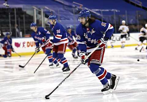 Mika Zibanejad #93 of the New York Rangers warms up before the game . (Photo by Elsa/Getty Images)