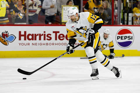 RALEIGH, NC – NOVEMBER 18: Bryan Rust #17 of the Pittsburgh Penguins skates with the puck during the warmups of the game against the Carolina Hurricanes at PNC Arena on November 18, 2023 in Raleigh, North Carolina. (Photo by Jaylynn Nash/Getty Images)