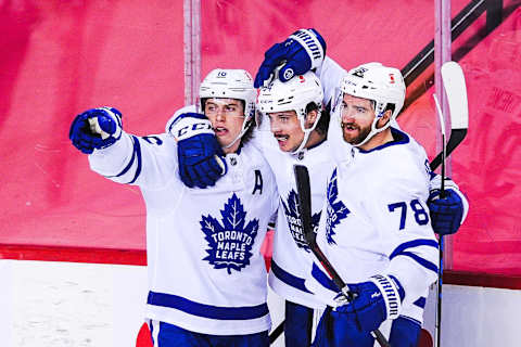 CALGARY, AB – APRIL 4: (L-R) Mitch Marner #16, Auston Matthews #34 and T.J. Brodie #78 of the Toronto Maple Leafs  . (Photo by Derek Leung/Getty Images)