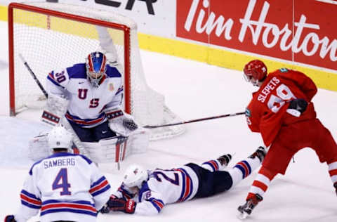 VANCOUVER , BC – JANUARY 4: Goaltender Cayden Primeau #30 of the United States makes a save on Kirill Slepets #29 of Russia during a semi-final game at the IIHF World Junior Championships at Rogers Arena on January 4, 2019 in Vancouver, British Columbia, Canada. (Photo by Kevin Light/Getty Images)