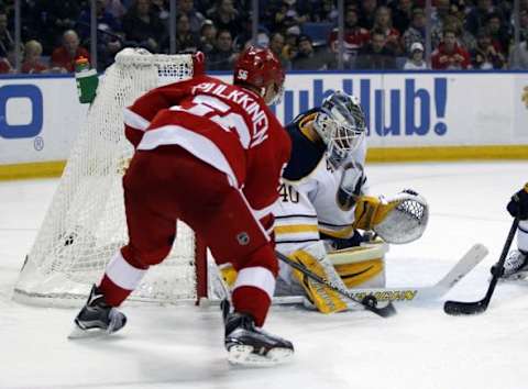 Jan 22, 2016; Buffalo, NY, USA; Buffalo Sabres goalie Robin Lehner (40) makes a save on Detroit Red Wings left wing Teemu Pulkkinen (56) during the third period at First Niagara Center. Detroit beats Buffalo 3 to 0. Mandatory Credit: Timothy T. Ludwig-USA TODAY Sports