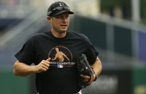 Sep 16, 2021; Pittsburgh, Pennsylvania, USA; Pittsburgh Pirates bench coach Don Kelly (12) jogs across the field before the game against the Cincinnati Reds at PNC Park. Mandatory Credit: Charles LeClaire-USA TODAY Sports