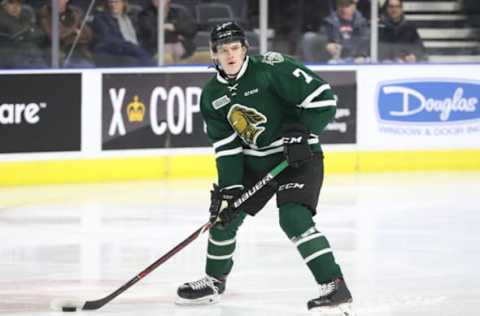 LONDON, ON – FEBRUARY 08: Joey Keane #7 of the London Knights with the puck in the first period during OHL game action against the Owen Sound Attack at Budweiser Gardens on February 8, 2019 in London, Canada. (Photo by Tom Szczerbowski/Getty Images)