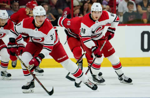 RALEIGH, NC – JUNE 30: Carolina Hurricanes Martin Necas (88) and Carolina Hurricanes Andrei Svechnikov (37) look to bring the puck up ice during the Canes Prospect Game at the PNC Arena in Raleigh, NC on June 30, 2018. (Photo by Greg Thompson/Icon Sportswire via Getty Images)