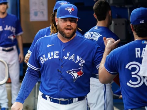 Aug 25, 2021; Toronto, Ontario, CAN; Toronto Blue Jays major league coach John Schneider in the dug out before a game against the Chicago White Sox at Rogers Centre. Mandatory Credit: John E. Sokolowski-USA TODAY Sports