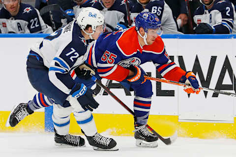 Edmonton Oilers, Dylan Holloway (55), Winnipeg Jets, Leon Gawanke (72). Mandatory Credit: Perry Nelson-USA TODAY Sports