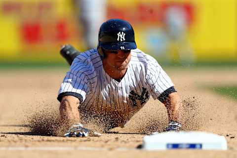 NEW YORK, NY – APRIL 10: Brett Garrdner #11 of the New York Yankees steals third base in the eighth inning during the game against the Tampa Bay Rays at Yankee Stadium on Monday, April 10, 2017 in the Bronx borough of New York City. (Photo by Alex Trautwig/MLB Photos via Getty Images)