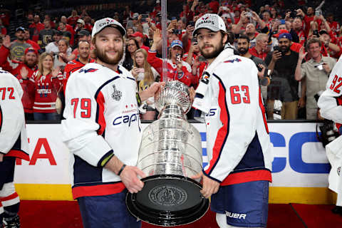 LAS VEGAS, NV – JUNE 07: Nathan Walker #79 and Shane Gersich #63 of the Washington Capitals pose for a photo with the Stanley Cup after their team’s 4-3 win over the Vegas Golden Knights in Game Five of the 2018 NHL Stanley Cup Final at T-Mobile Arena on June 7, 2018 in Las Vegas, Nevada. (Photo by Bruce Bennett/Getty Images)