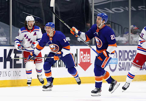 Kyle Palmieri #21 and Travis Zajac #14 of the New York Islanders (Photo by Bruce Bennett/Getty Images)