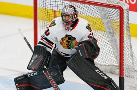 NHL Power Rankings: Chicago Blackhawks goaltender Corey Crawford (50) makes a save against the Edmonton Oilers at Rogers Place. Mandatory Credit: Perry Nelson-USA TODAY Sports