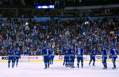 The Vancouver Canucks salute their fans after playing their last game of the season (Photo by Rich Lam/Getty Images)