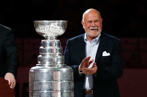 Feb 13, 2016; Raleigh, NC, USA; Carolina Hurricanes owner Peter Karmanos Jr. stands next to the Stanley Cup before the game against the New York Islanders at PNC Arena. The Carolina Hurricanes defeated the New York Islanders 6-3. Mandatory Credit: James Guillory-USA TODAY Sports