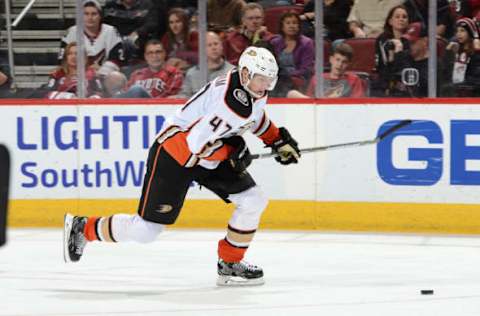 GLENDALE, AZ: Hampus Lindholm #47 of the Anaheim Ducks skates the puck up ice against the Arizona Coyotes at Gila River Arena on April 7, 2018. (Photo by Norm Hall/NHLI via Getty Images)