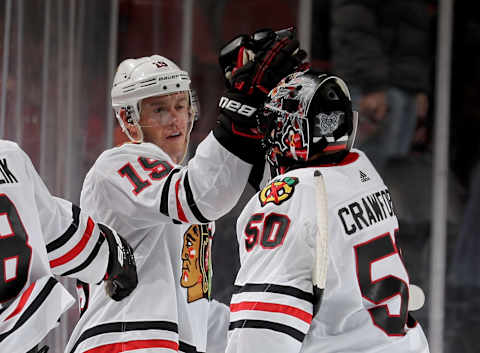 Corey Crawford #50 after a win over the New Jersey Devils (Photo by Elsa/Getty Images)