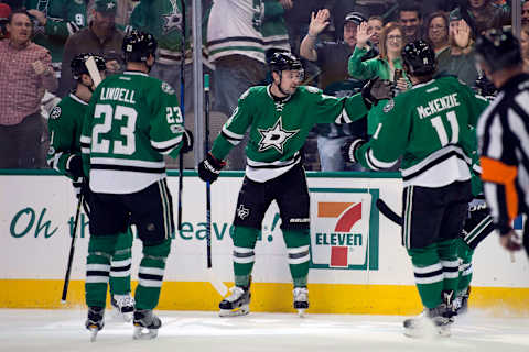 Feb 24, 2017; Dallas, TX, USA; Dallas Stars center Devin Shore (17) and defenseman Esa Lindell (23) and left wing Curtis McKenzie (11) celebrates a goal by Shore against the Arizona Coyotes during the first period at the American Airlines Center. Mandatory Credit: Jerome Miron-USA TODAY Sports