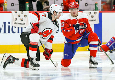 WASHINGTON, DC – JANUARY 16: Washington Capitals left wing Jakub Vrana (13) talks with New Jersey Devils center Pavel Zacha (37) prior to their game on January 16, 2020 at the Capital One Arena in Washington, D.C. (Photo by Mark Goldman/Icon Sportswire via Getty Images)