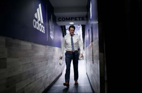 TORONTO, ON – APRIL 21: Mike Babcock head coach of the Toronto Maple Leafs walks to the dressing room before playing the Boston Bruins in Game Six of the Eastern Conference First Round during the 2019 NHL Stanley Cup Playoffs at the Scotiabank Arena on April 21, 2019 in Toronto, Ontario, Canada. (Photo by Mark Blinch/NHLI via Getty Images)