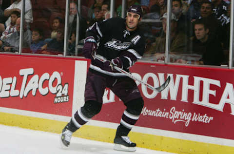 ANAHEIM, CA: Keith Carney #3 of the Anaheim Ducks plays the puck against the Phoenix Coyotes on October 23, 2005. The Ducks defeated the Coyotes 5-3. (Photo by Donald Miralle/Getty Images)