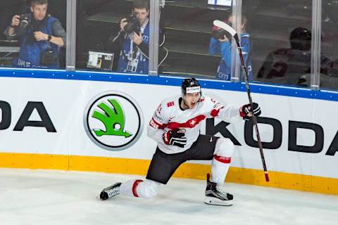 PARIS, FRANCE – MAY 13: #61 Fabrice Herzog (SUI) celebrates his goal during the Ice Hockey World Championship between Canada and Switzerland at AccorHotels Arena in Paris, France, on May 13, 2017. (Photo by Robert Hradil/Icon Sportswire via Getty Images)