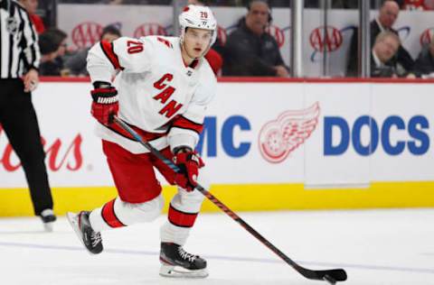 Mar 10, 2020; Detroit, Michigan, USA; Carolina Hurricanes center Sebastian Aho (20) skates with the puck during the third period against the Detroit Red Wings at Little Caesars Arena. Mandatory Credit: Raj Mehta-USA TODAY Sports