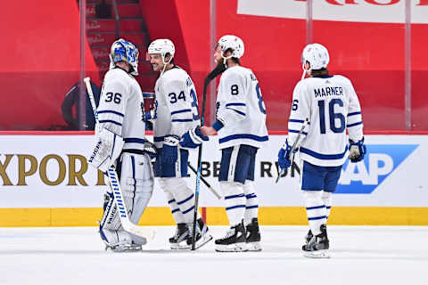 MONTREAL, QC – MAY 25: Auston Matthews #34, Jake Muzzin #8 and Mitchell Marner #16 of the Toronto Maple Leafs   (Photo by Minas Panagiotakis/Getty Images)