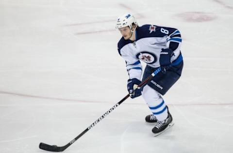 Nov 27, 2015; Saint Paul, MN, USA; Winnipeg Jets defenseman Jacob Trouba (8) against the Minnesota Wild at Xcel Energy Center. The Jets defeated the Wild 3-1. Mandatory Credit: Brace Hemmelgarn-USA TODAY Sports