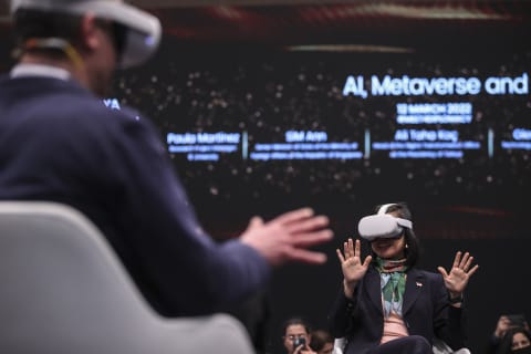 Attendees experience the Metaverse concept of VR science during the panel on entitled “Artificial Intelligence (AI), Metaverse and all Else” within the Antalya Diplomacy Forum in Antalya, Turkiye. Photo by Arif Hudaverdi Yaman/Anadolu Agency via Getty Images