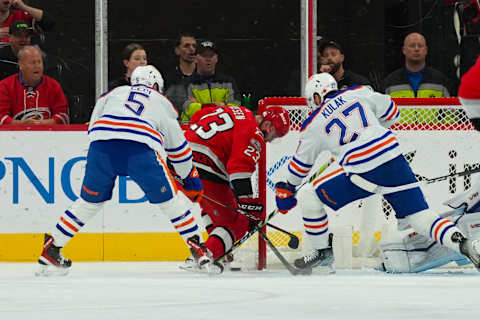 Nov 10, 2022; Raleigh, North Carolina, USA; Edmonton Oilers defenseman Cody Ceci (5) and defenseman Brett Kulak (27) stop the scoring attempt by Carolina Hurricanes right wing Stefan Noesen (23) during the second period at PNC Arena. Mandatory Credit: James Guillory-USA TODAY Sports