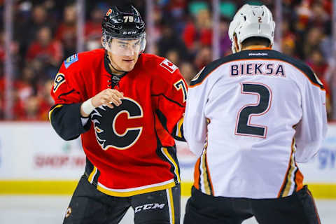 Dec 4, 2016; Calgary, Alberta, CAN; Calgary Flames left wing Micheal Ferland (79) and Anaheim Ducks defenseman Kevin Bieksa (2) fight during the first period at Scotiabank Saddledome. Mandatory Credit: Sergei Belski-USA TODAY Sports