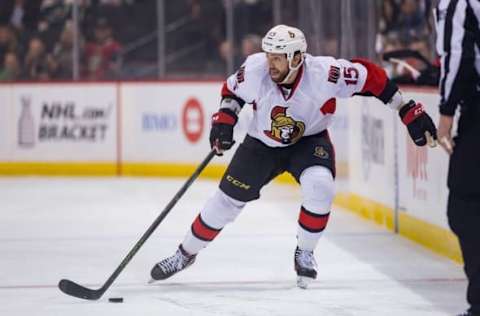 Mar 31, 2016; Saint Paul, MN, USA; Ottawa Senators forward Zack Smith (15) skates with the puck in the first period against the Minnesota Wild at Xcel Energy Center. the Ottawa Senators beat the Minnesota Wild 3-2. Mandatory Credit: Brad Rempel-USA TODAY Sports