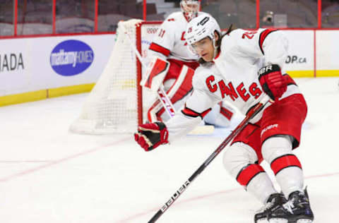 OTTAWA, ONTARIO – JANUARY 27: Ethan Bear #25 of the Carolina Hurricanes skates against the Ottawa Senators at Canadian Tire Centre on January 27, 2022, in Ottawa, Ontario. (Photo by Chris Tanouye/Getty Images)