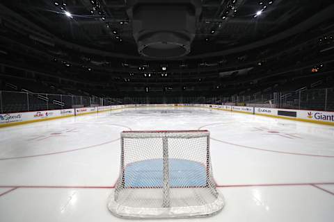 A goal sits on the empty ice (Photo by Patrick Smith/Getty Images)