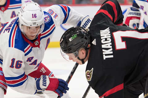 Feb 20, 2022; Ottawa, Ontario, CAN; New York Rangers center Ryan Strome (16) faces off against Ottawa Senators left wing Brady Tkachuk (7) in the second period at the Canadian Tire Centre. Mandatory Credit: Marc DesRosiers-USA TODAY Sports