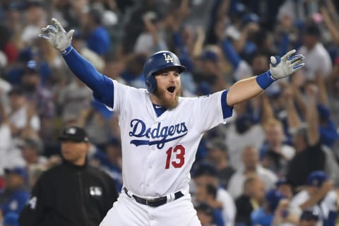 LOS ANGELES, CA – OCTOBER 26: Max Muncy #13 of the Los Angeles Dodgers celebrates his eighteenth inning walk-off home run to defeat the the Boston Red Sox 3-2 in Game Three of the 2018 World Series at Dodger Stadium on October 26, 2018 in Los Angeles, California. (Photo by Harry How/Getty Images)