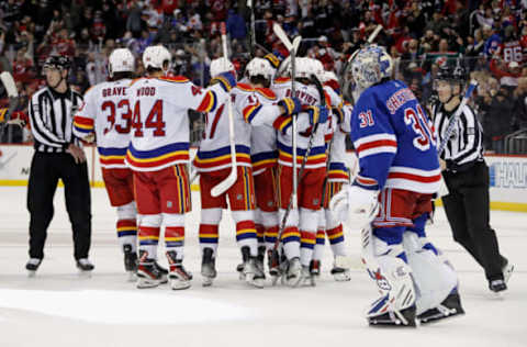 NEWARK, NEW JERSEY – JANUARY 07: The New Jersey Devils celebrate a 4-3 overtime victory against Igor Shesterkin #31 and the New York Rangers at the Prudential Center on January 07, 2023, in Newark, New Jersey. (Photo by Bruce Bennett/Getty Images )