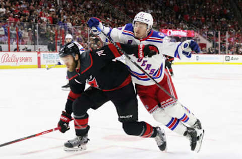 RALEIGH, NORTH CAROLINA – MAY 18: Frank Vatrano #77 of the New York Rangers skates against Jaccob Slavin #74 of the Carolina Hurricanes in Game One of the Second Round of the 2022 Stanley Cup Playoffs at PNC Arena on May 18, 2022, in Raleigh, North Carolina. (Photo by Bruce Bennett/Getty Images)