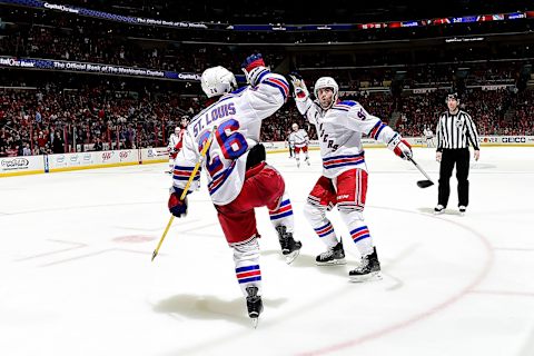 WASHINGTON, DC – MARCH 11: Martin St. Louis #26 of the New York Rangers celebrates with Keith Yandle #93 of the New York Rangers after scoring a goal in the third period against the Washington Capitals during an NHL game at Verizon Center on March 11, 2015 in Washington, DC. (Photo by Patrick McDermott/NHLI via Getty Images)