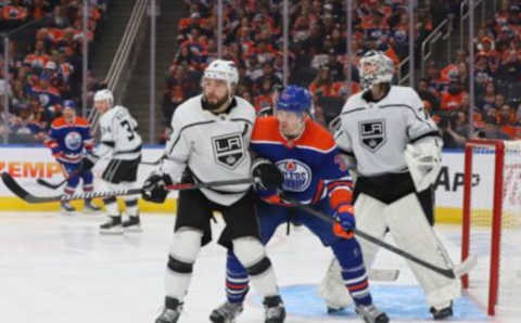 EDMONTON, CANADA – APRIL 17: Drew Doughty #8 of the Los Angeles Kings battles with Warren Foegele #37 of the Edmonton Oilers in overtime in Game One of the First Round of the 2023 Stanley Cup Playoffs on April 17, 2023 at Rogers Place in Edmonton, Alberta, Canada. (Photo by Lawrence Scott/Getty Images)