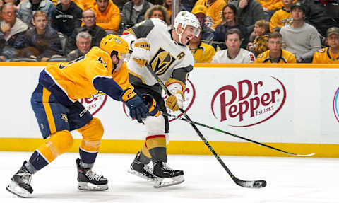 NASHVILLE, TN – NOVEMBER 27: Reilly Smith #19 of the Vegas Golden Knights shoots the puck against Dante Fabbro #57 of the Nashville Predators at Bridgestone Arena on November 27, 2019 in Nashville, Tennessee. (Photo by John Russell/NHLI via Getty Images)