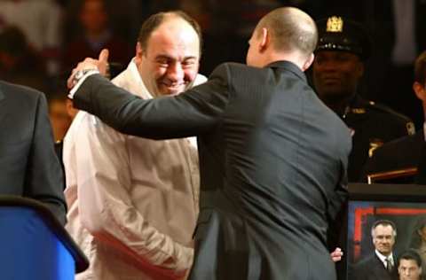 James Gandolfini greets former New York Rangers player Adam Graves #9 (Photo by Chris McGrath/Getty Images)