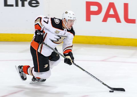 WINNIPEG, MB – JANUARY 13: Hampus Lindholm #47 of the Anaheim Ducks plays the puck up the ice during second-period action against the Winnipeg Jets at the Bell MTS Place on January 13, 2019, in Winnipeg, Manitoba, Canada. The Jets defeated the Ducks 4-3 in overtime. (Photo by Jonathan Kozub/NHLI via Getty Images)