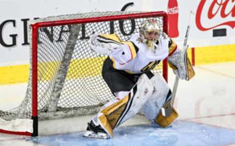 Mar 23, 2023; Calgary, Alberta, CAN; Vegas Golden Knights goaltender Logan Thompson (36) warms up before a game against the Calgary Flames at Scotiabank Saddledome. Mandatory Credit: Brett Holmes-USA TODAY Sports