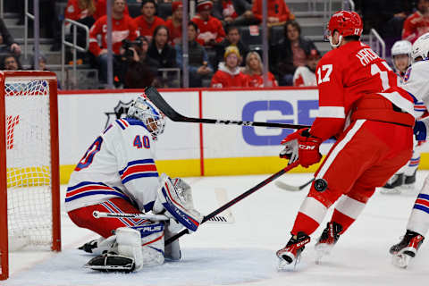 Mar 30, 2022; Detroit, Michigan, USA; New York Rangers goaltender Alexandar Georgiev (40) makes a save on a shot by Detroit Red Wings defenseman Filip Hronek (17) in the second period at Little Caesars Arena. Mandatory Credit: Rick Osentoski-USA TODAY Sports