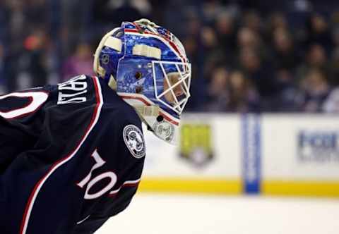 Feb 16, 2016; Columbus, OH, USA; Columbus Blue Jackets goalie Joonas Korpisalo (70) looks on during a stop in play against the Boston Bruins in the third period at Nationwide Arena. The Bruins won 2-1 in overtime. Mandatory Credit: Aaron Doster-USA TODAY Sports