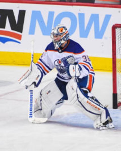 CALGARY, CANADA – OCTOBER 29: Jack Campbell #36 of the Edmonton Oilers in action against the Calgary Flames during an NHL game at Scotiabank Saddledome on October 29, 2022 in Calgary, Alberta, Canada. (Photo by Derek Leung/Getty Images)